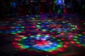 Disco in club. Dance floor in colored spots. Light music in club Royalty Free Stock Photo