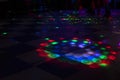 Disco in club. Dance floor in colored spots. Light music in club Royalty Free Stock Photo