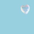 disco heart flying.love concept design.aesthetic heart design on a soft blue sky background.valentine holidays idea.happy