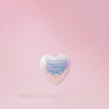 disco heart flying.love concept design.aesthetic heart design on a soft pink background.valentine holidays idea