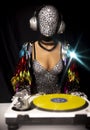 Disco woman with headphones Djing