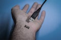 Disconnect, human hand unplugged from an USB jack Royalty Free Stock Photo