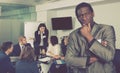 Discontent African American businessman in meeting room