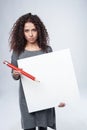 Curly woman with whiteboard