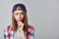 Discontent teen girl looking at copy space Royalty Free Stock Photo