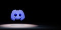 Discord Logo Spotlighted on Black Background Royalty Free Stock Photo