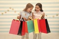 Discount concept. Kids cute girls hold shopping bags. Shopping discount season. Spending great time together. Children