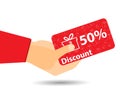 Discount coupons in hand. 50-percent discount. Special offer. Gift boxes on background.