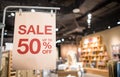 Discount percentage sign display in  fashion department store during sale season period Royalty Free Stock Photo