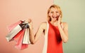 Discounts and loyalty program. Real sale. Woman on shopping tour. Girl with paper bags. Black friday concept. Happy Royalty Free Stock Photo