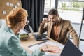 discouraged manager looking at papers near Royalty Free Stock Photo