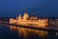 Discover Budapest Landmarks Aerial View of Hungarian Parliament Building and Danube River in Cityscape. Night