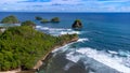 Small islands and Perahu Hill are located on the coast of Goa Cina and Watu Leter Beach Royalty Free Stock Photo