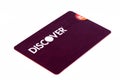 Discover credit card close up on white background. Selective focus with shallow depth of field