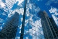 Modern office building with reflection of blue sky and clouds in glass wall Ai generative Royalty Free Stock Photo