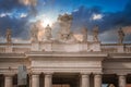 Vatican City classical building with statues and coat of arms on balustrade, dramatic sky, ambiance. Royalty Free Stock Photo