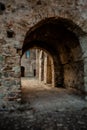 Discover the Secrets of Rocca Imperiale: Italian Street Tunnel Leading to Historic House Entrance Royalty Free Stock Photo