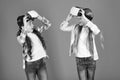 Discover virtual reality. Kids girls play virtual reality game. Friends interact in vr. Explore alternative reality Royalty Free Stock Photo