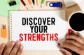 Discover your strengths- business concept of entrepreneur management message on wood background with paper clips