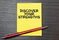 Discover Your Strengths written on note. Business Concept. Top view Royalty Free Stock Photo