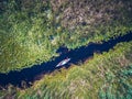 Discovering Danube Delta in a Canoe aerial view Royalty Free Stock Photo