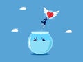 Discovering a new life. Businesswoman heart flying out of a fishbowl. business concept