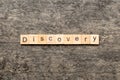 discovery word written on wood block. discovery text on table, concept