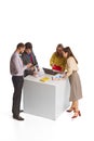 Group of young people, businessmen, office workers in business style clothes isolated over white background. Teamwork