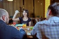 Discussion of three angry friends arguing in a coffee shop Royalty Free Stock Photo