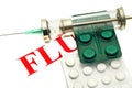 Disease alert - pills and syringe over white Royalty Free Stock Photo