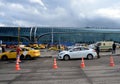 Disembarkation of passengers from a taxi at the international airport `Domodedovo` in Moscow Royalty Free Stock Photo