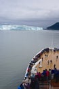 Disenchantment Bay, Alaska: Passengers on the bow of a cruise ship Royalty Free Stock Photo