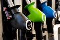 Disesel and gasoline pumps on a gas station. Fuel nozzles oil dispensers. Petrol gas diesel fuel prices concept Royalty Free Stock Photo