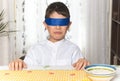 Disgust gesture on the face of an 8-year-old boy after having done a food taste test. Royalty Free Stock Photo