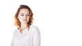 Disgusted and frowning young woman on a white background