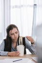 disgusted overworked manageress with box of junk take away noodles