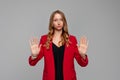 Disgusted stressed out angry blonde young woman keeping hands in stop gesture, trying to defend herself as if saying: Stay away Royalty Free Stock Photo