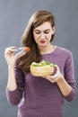 Disgusted woman unhappy with her meal Royalty Free Stock Photo