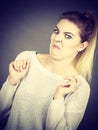 Disgusted woman having funny face expression Royalty Free Stock Photo