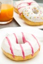 Dish with assorted donuts, coffee and juice Royalty Free Stock Photo