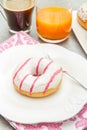 Dish with assorted donuts, coffee and juice Royalty Free Stock Photo
