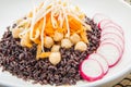 Dish with black rice, chick peas and carrots Royalty Free Stock Photo