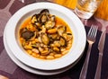 Dish of boiled beans and clams mussels Royalty Free Stock Photo