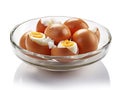 A dish of boiled eggs on a white