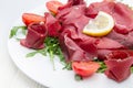 Dish of bresaola and aragula Royalty Free Stock Photo