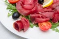 Dish of bresaola and aragula Royalty Free Stock Photo