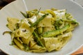 The dish `cenci a zucchini` - pasta with zucchini - typical italian food