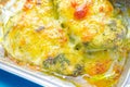 A dish of chicken and cheese is sitting in a baking tray Royalty Free Stock Photo