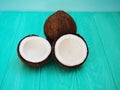 Dish Of Coconut Milk With A Split Fresh Coconut Royalty Free Stock Photo