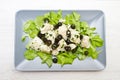 Dish of cod salad with black olives Royalty Free Stock Photo
